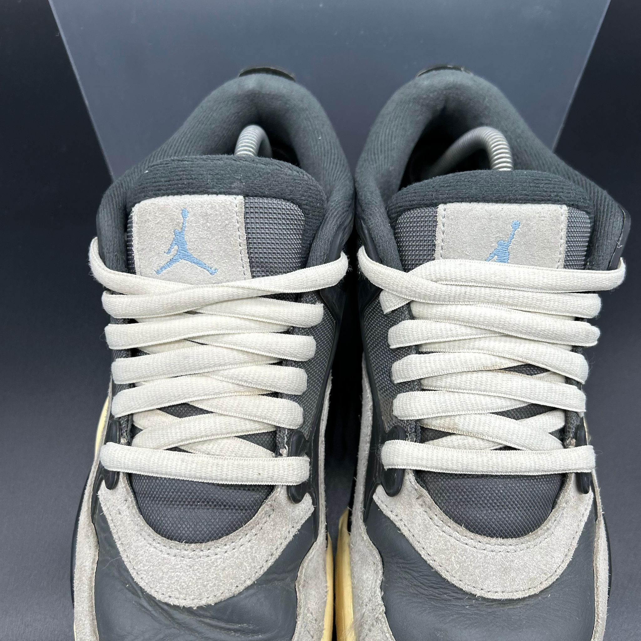 Air Jordan 4 RM – Black / University Blue – EU 42.5 / US 9 (Used)