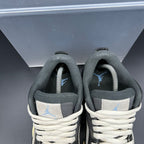 Air Jordan 4 RM – Black / University Blue – EU 42.5 / US 9 (Used)