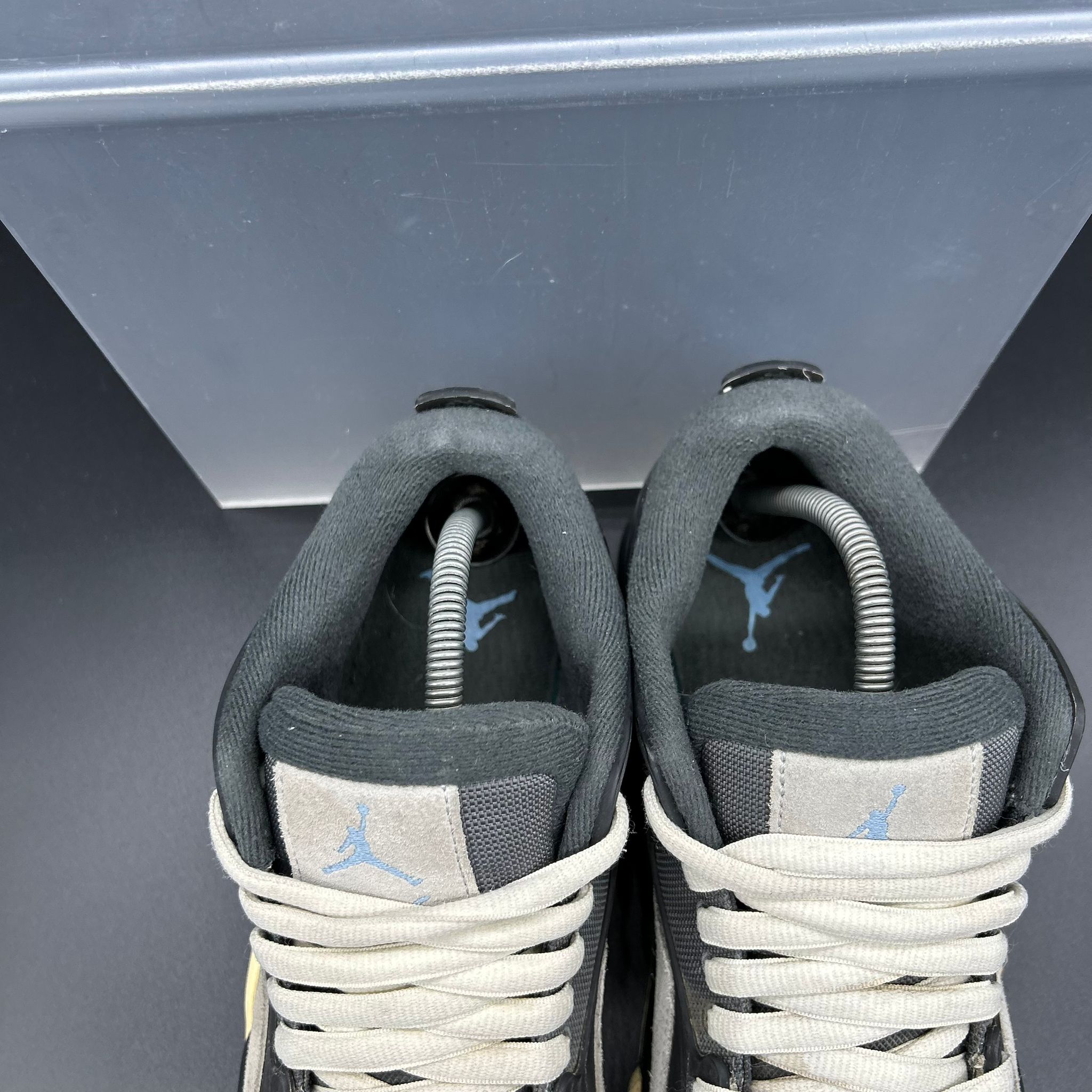 Air Jordan 4 RM – Black / University Blue – EU 42.5 / US 9 (Used)